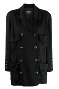 Black Chanel double-breasted cashmere blazer with structured lapels and tailored fit, stylish and luxurious for formal wear.