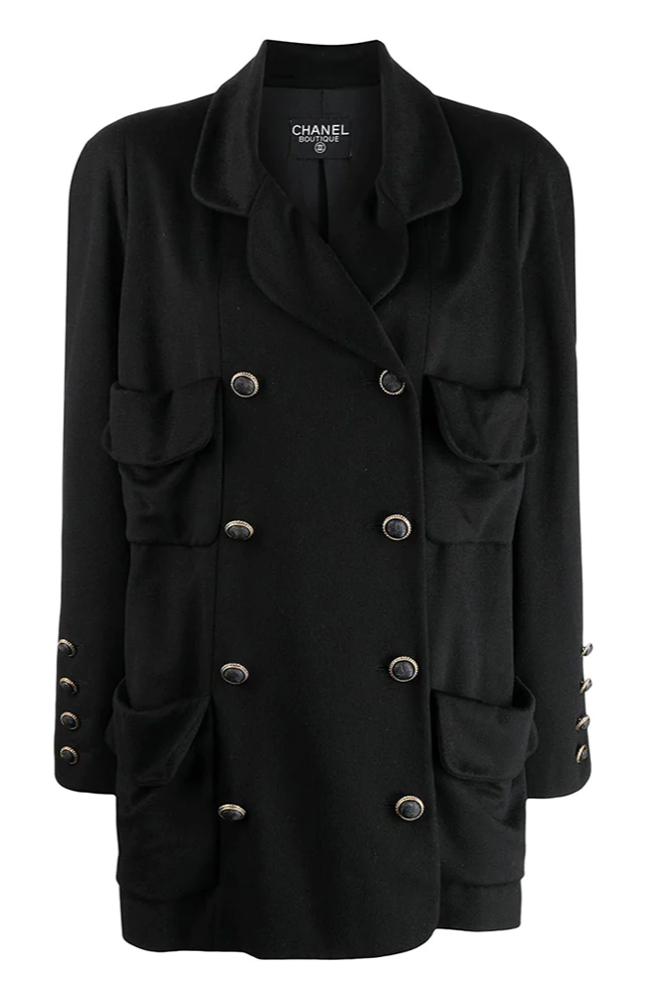 Black Chanel double-breasted cashmere blazer with structured lapels and tailored fit, stylish and luxurious for formal wear.