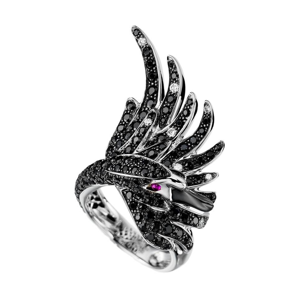 Boucheron Cypris Swan black diamond ring featuring white and black gold with intricate detailing and sparkling diamonds.