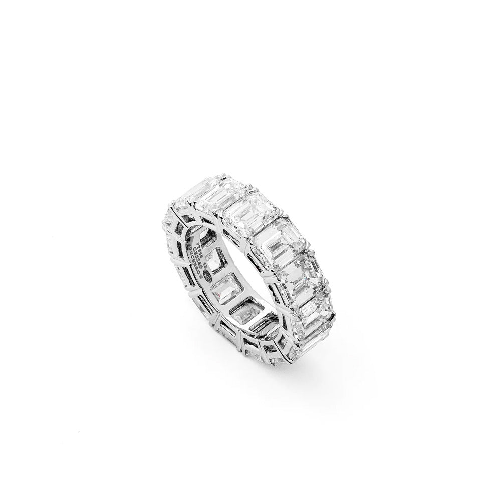 Elegant Boucheron eternity ring with a continuous row of sparkling diamonds in a sleek gold band.