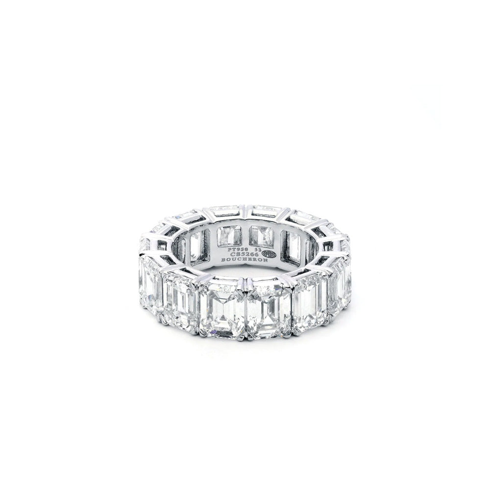 Elegant Boucheron Eternity Ring with a continuous row of sparkling gemstones on a sleek gold band.