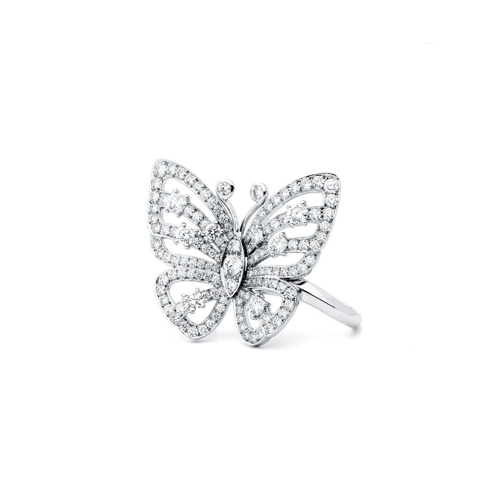 Van Cleef & Arpels butterfly ring featuring intricate butterfly design with gold and gemstone accents.