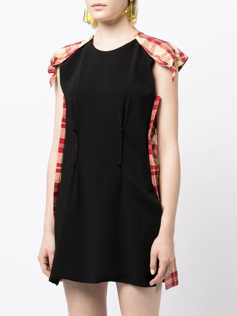 Celine checked panelled mini dress with long sleeves and a fitted silhouette, displayed from the front.
