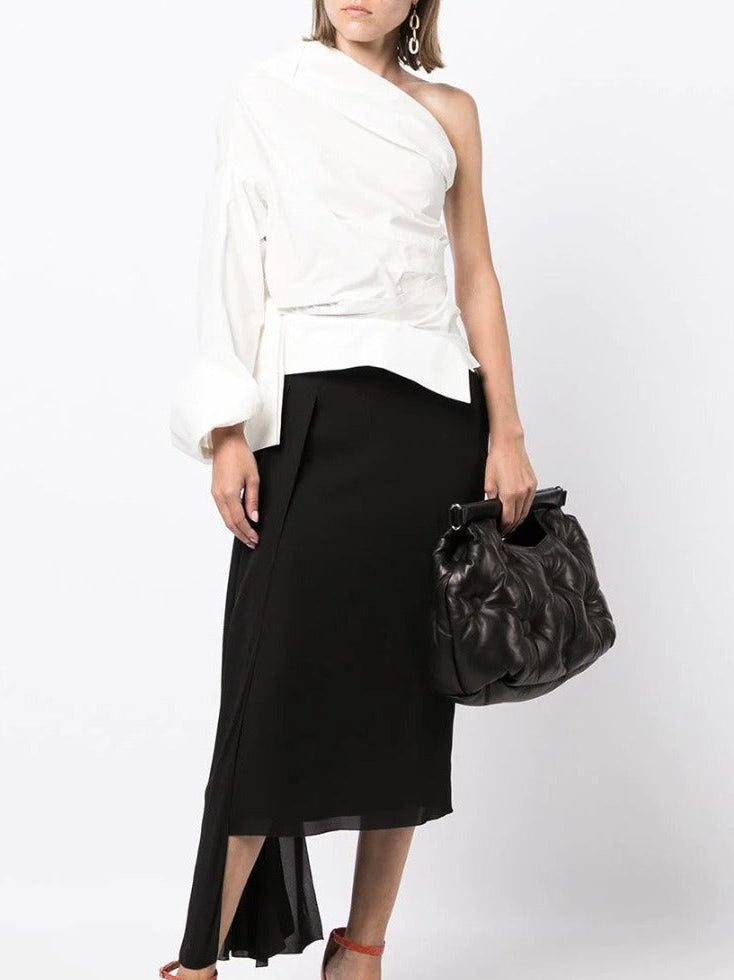 Chanel asymmetric silk midi skirt with elegant drape and design, front view showcasing its stylish silhouette.