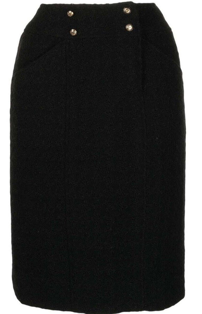 Chanel tweed pencil skirt, tailored high-waisted design with classic checkered pattern and elegant silhouette.
