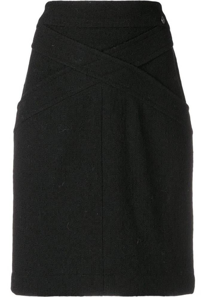 Black wool crisscross skirt from Chanel featuring a stylish, high-waisted design with a textured pattern.