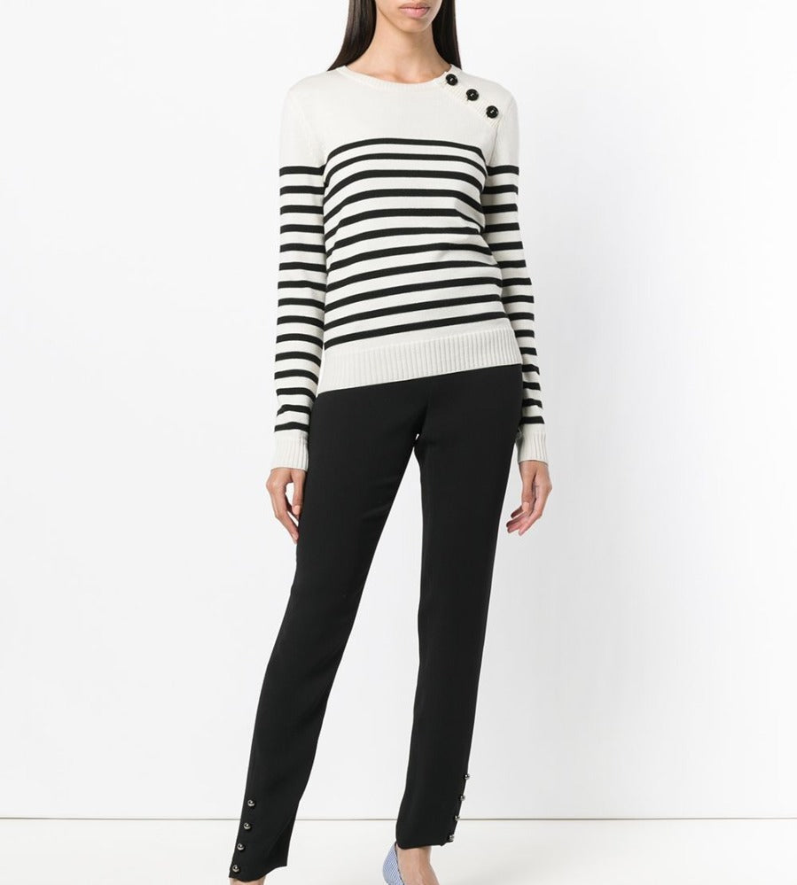 Black silk trousers from Chanel with a sleek, tailored fit and elegant design, perfect for stylish, sophisticated outfits.