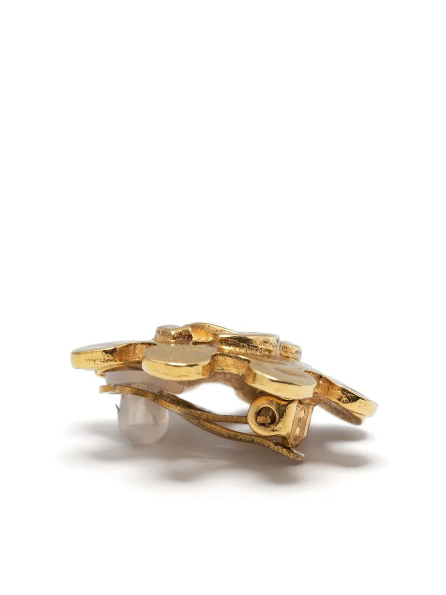 Chanel Cut Out Wheel Clip-On Earrings featuring circular design with signature CC logo on a clean background.