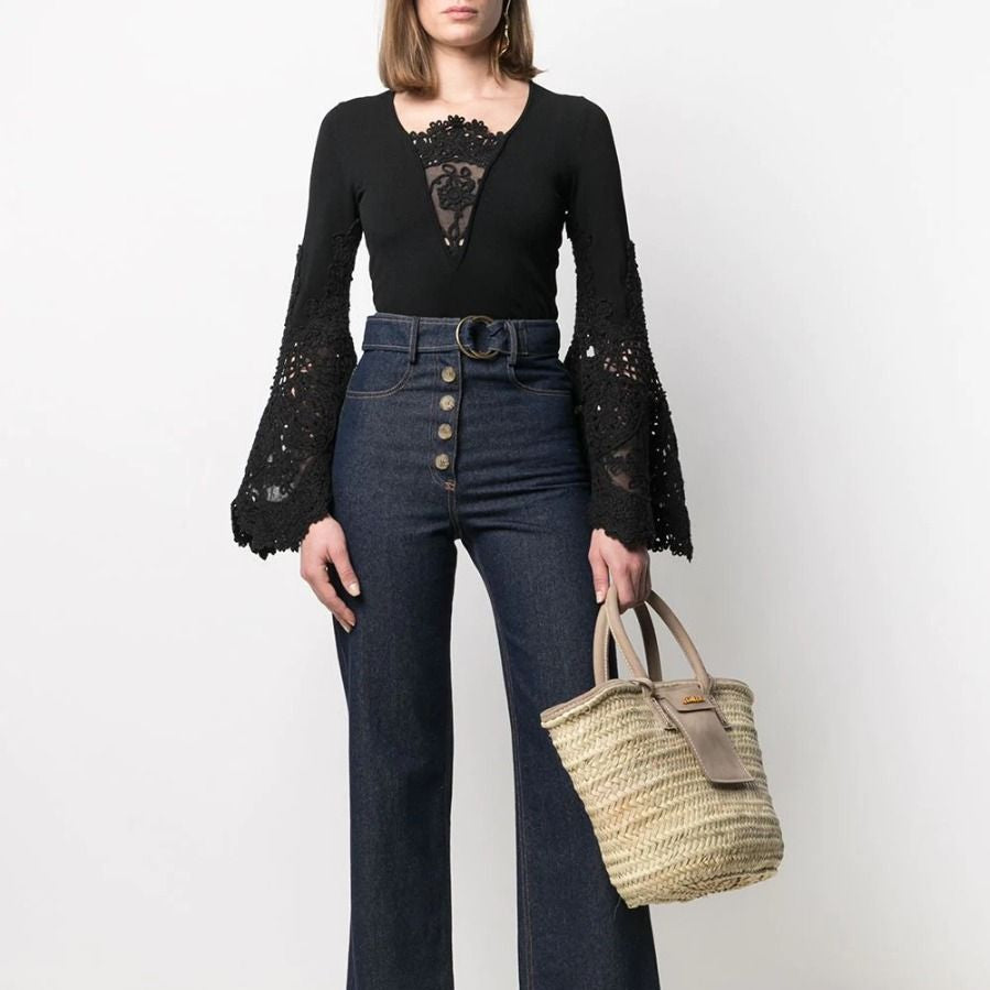 Chanel crochet sleeve jumper, a stylish knit top with intricate crochet sleeves and classic design details.