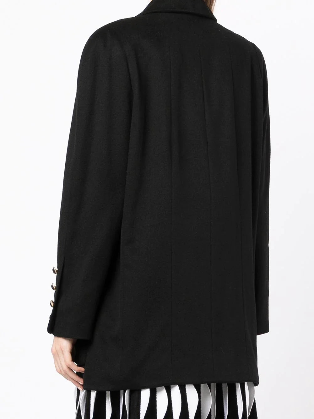 Chanel double-breasted cashmere blazer in classic design with tailored fit, shown on a hanger against a neutral background.