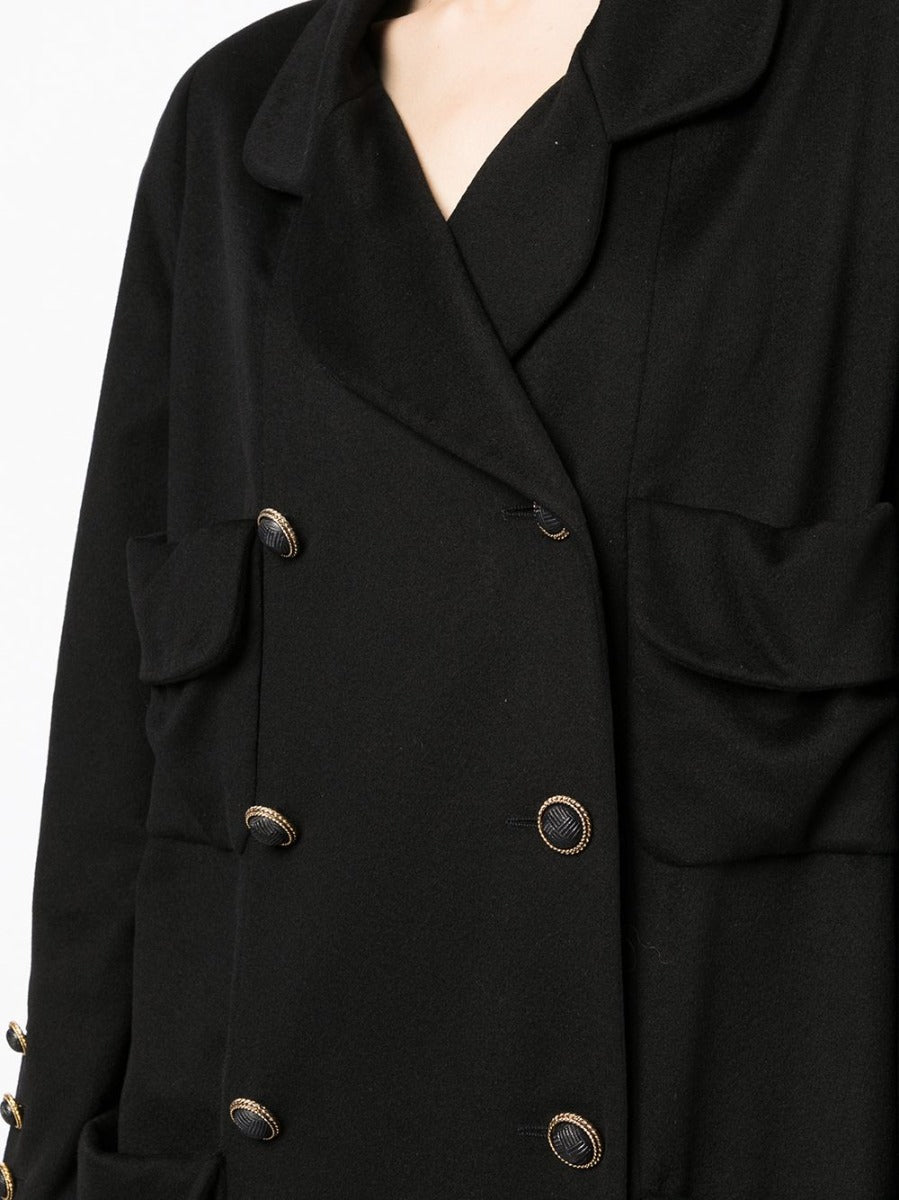 Chanel double-breasted cashmere blazer in classic black, tailored fit, with gold buttons and lapel collar.