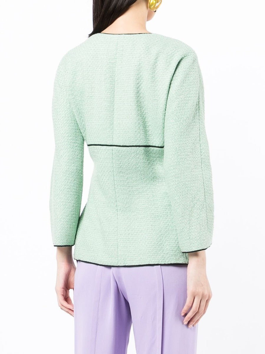 Chanel green belted tweed jacket with structured blazer style, featuring classic tweed fabric and a stylish waist belt.