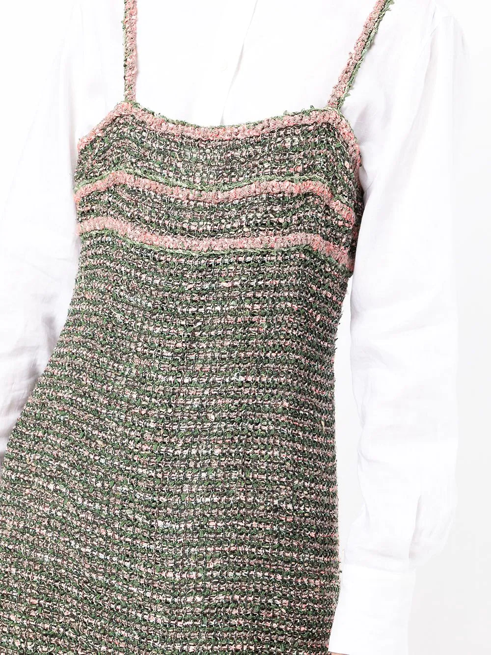 Chanel green tweed dress with classic tailored design and textured fabric, showcased on a model.