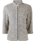 Chanel grey tweed zip jacket with tailored fit and classic collar, perfect for stylish casual or semi-formal wear.