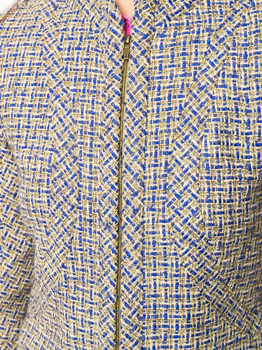 Chanel grey tweed zip jacket with a classic collar and front zipper, stylish blazer for sophisticated fashion looks.