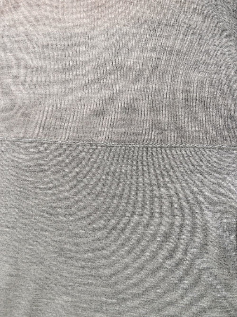 Chanel long grey hooded lounge top with relaxed fit and soft fabric, featuring a hood and casual style.
