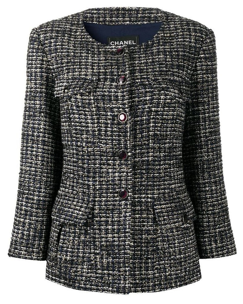 Navy Chanel bouclé tweed blazer with classic tailored fit and textured fabric, stylish for sophisticated outfits.