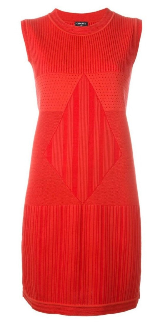 Chanel sleeveless red knit dress displayed on a hanger, showcasing its vibrant color and stylish sleeveless design.