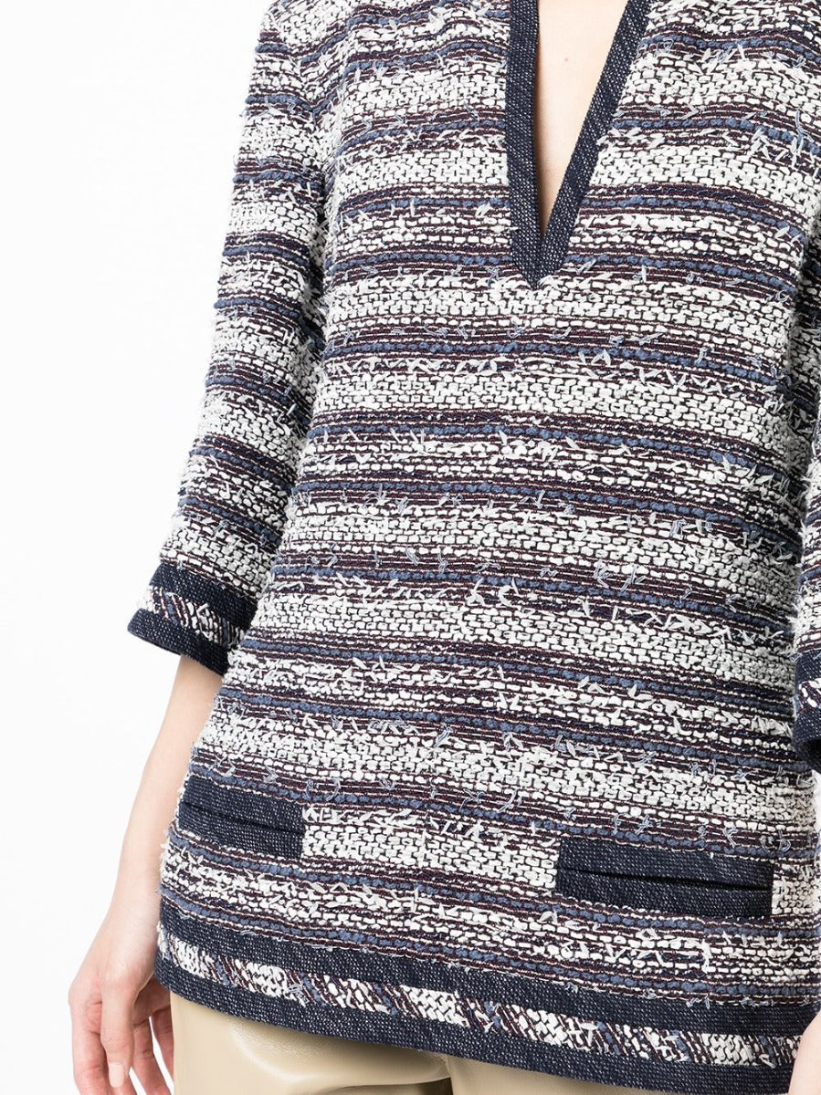 Chanel striped blue tweed tunic top with long sleeves and classic tailored design, showcasing elegant craftsmanship.