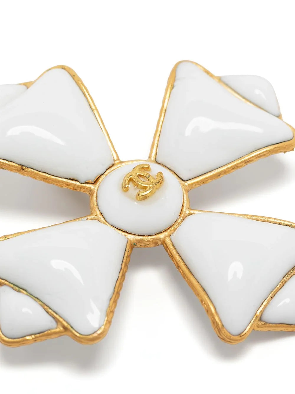White Chanel Maltese Cross brooch with gold accents, classic jewelry accessory featuring a detailed cross design.