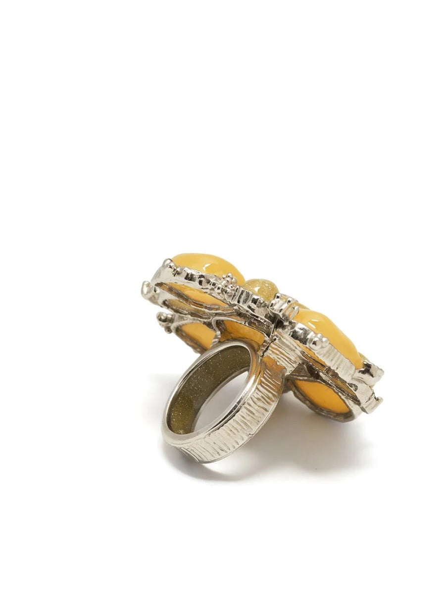 Chanel yellow stone embellished ring with intricate detailing, showcasing a vibrant yellow gemstone on a stylish gold band.