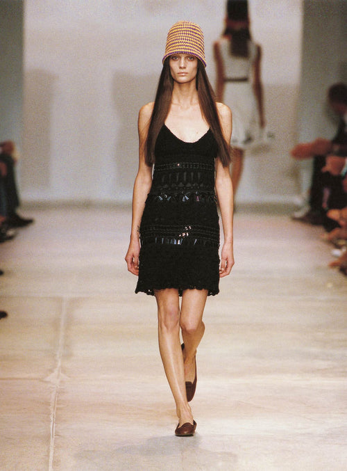 Prada 2005 panelled sleeveless dress featuring a stylish design with panel details and a fitted silhouette.