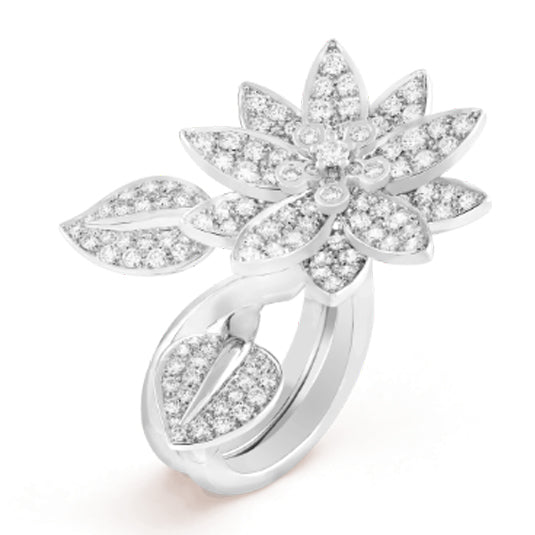 Van Cleef & Arpels Diamond Lotus between the finger ring, featuring intricate gold design and sparkling diamonds.