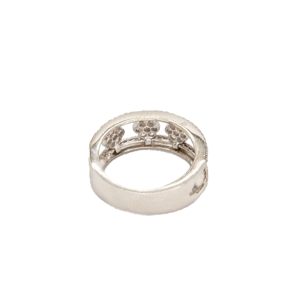 Messika Diamond Floral Ring featuring a delicate floral design with sparkling diamonds on a sleek band.