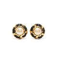 Chanel 1970s pearl button earrings featuring classic round pearls and gold-tone settings on a clean background.