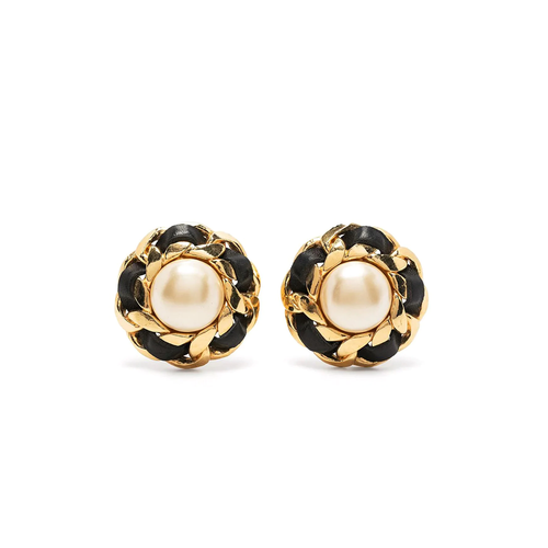 Chanel 1970s pearl button earrings featuring classic round pearls and gold-tone settings on a clean background.