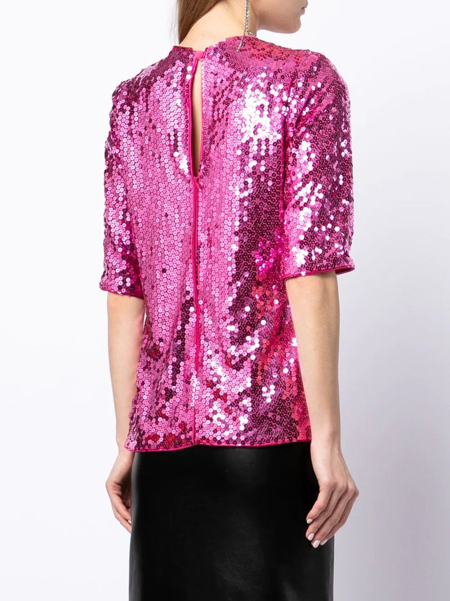 Yves Saint Laurent Rive Gauche sequin top with shimmering silver sequins and a stylish sleeveless design.