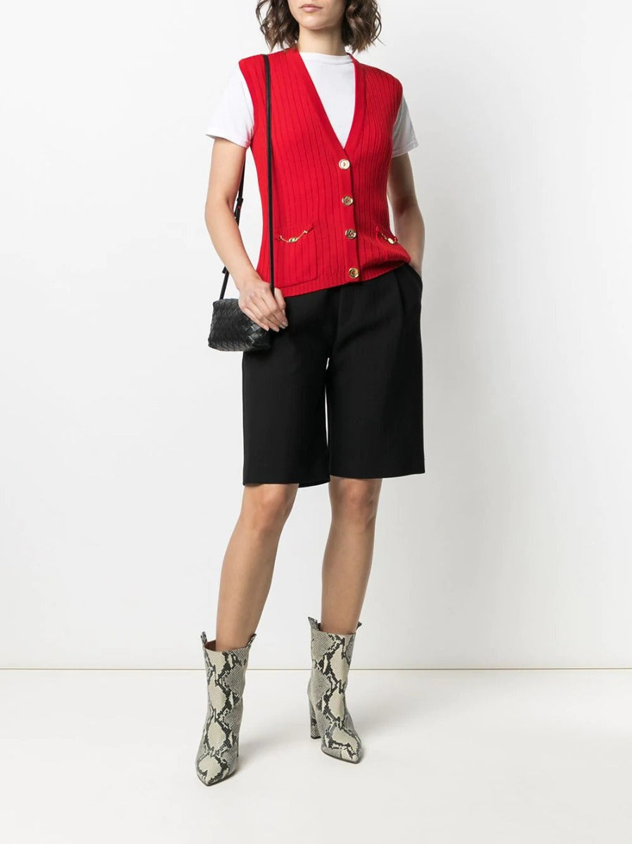 Celine sleeveless wool cardigan top in neutral color with ribbed hem and neckline, stylish and perfect for layered fall outfits.