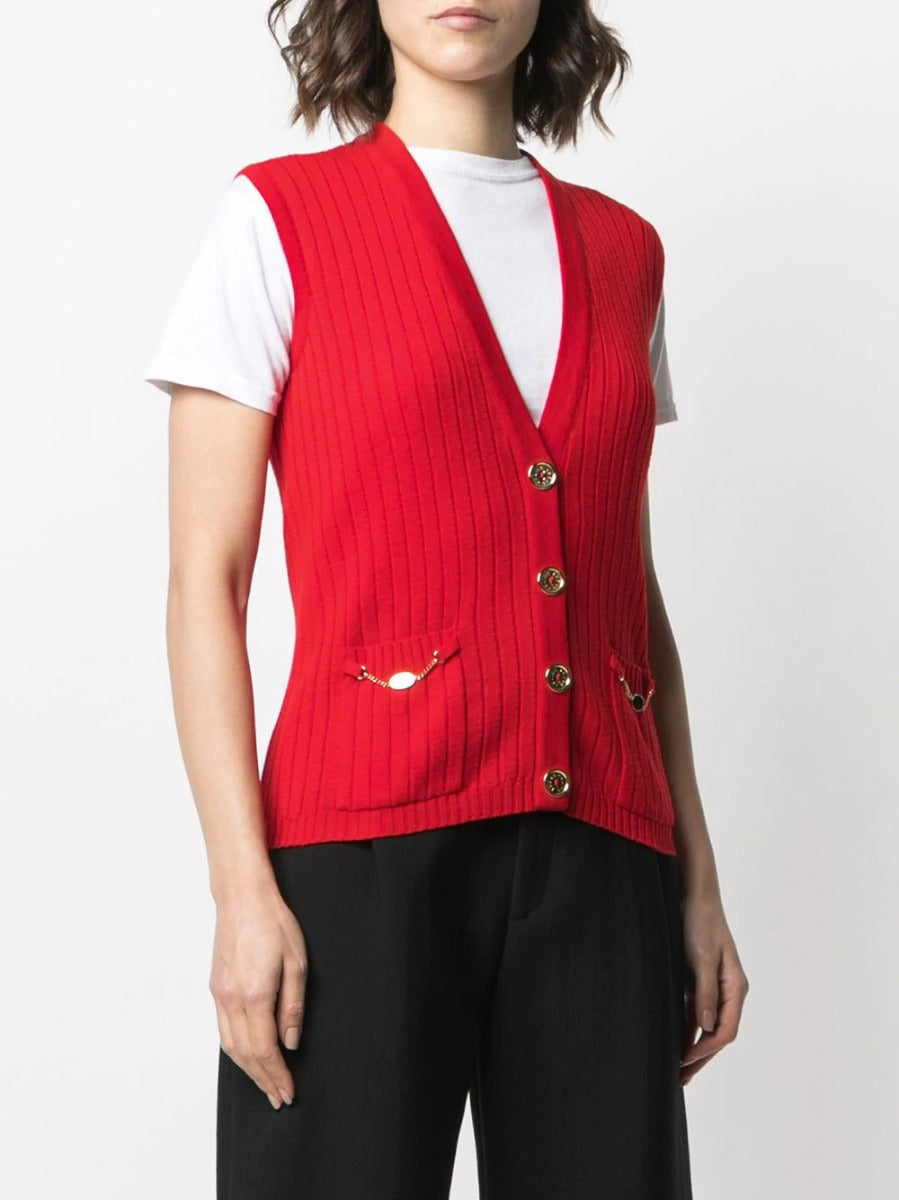 Celine sleeveless wool cardigan displayed as a stylish top with a fitted design and neutral color, perfect for layered outfits.