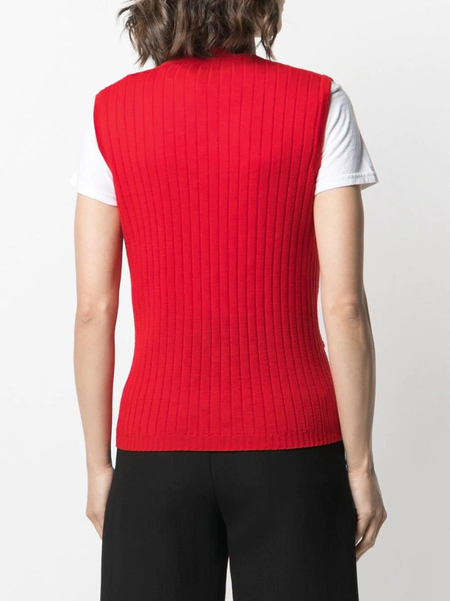 Celine sleeveless wool cardigan top in neutral tones, showcasing a stylish and cozy sleeveless knit design.