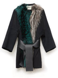 Fendi fur collar coat hanging on a clothing rack, stylish winter outerwear with a plush fur collar and tailored design.