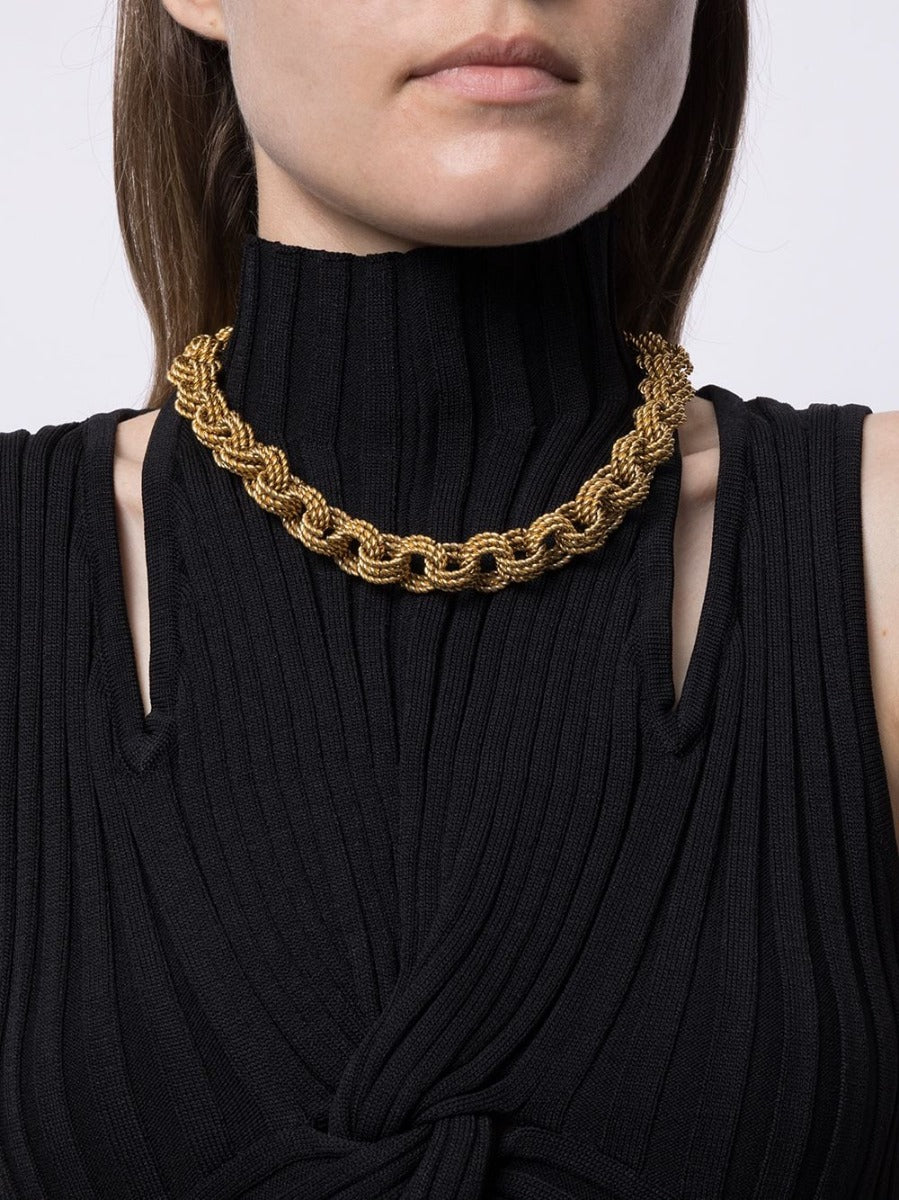 Thick gold chunky chain necklace from Other Designers, featuring bold links and a modern style for statement jewelry.