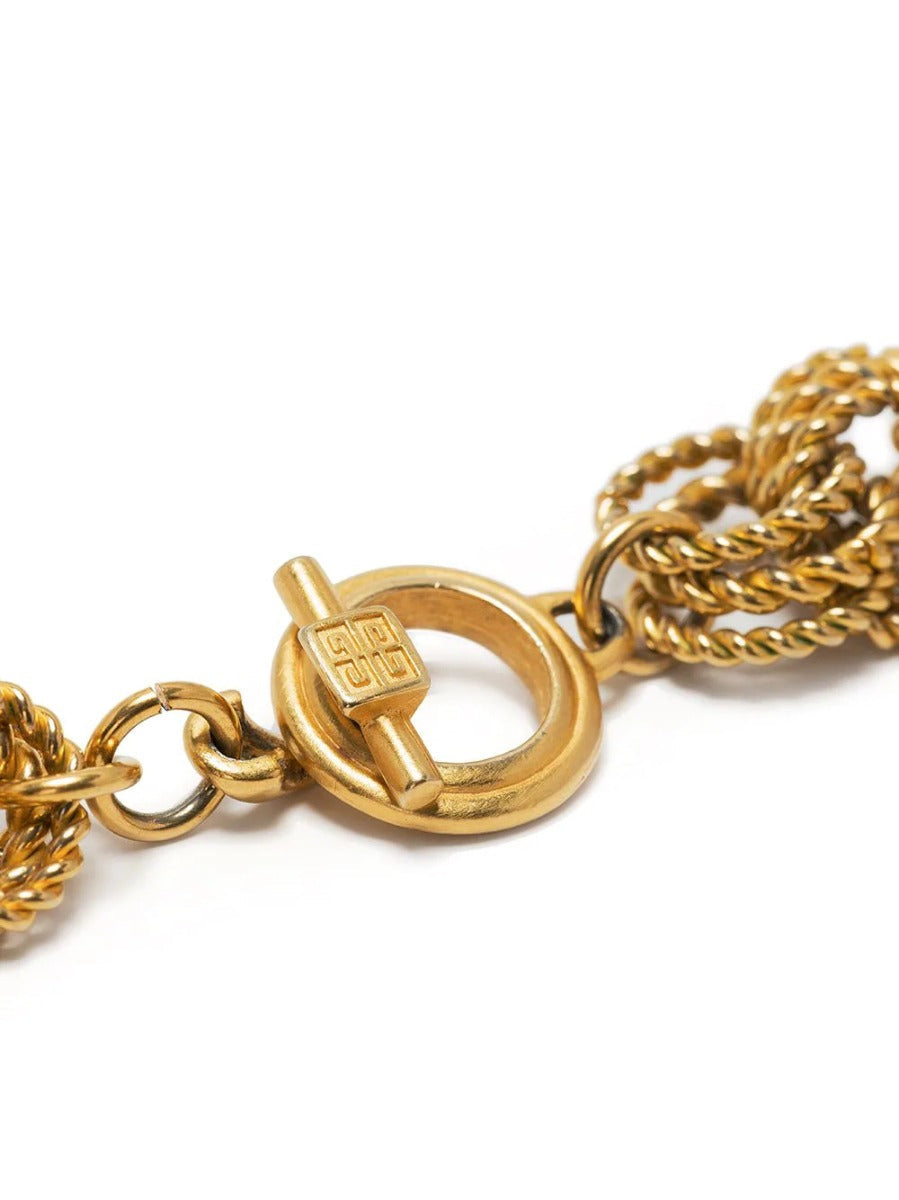 Givenchy chunky chain necklace featuring large interlinked metal chains, stylish and bold accessory for fashionable outfits.
