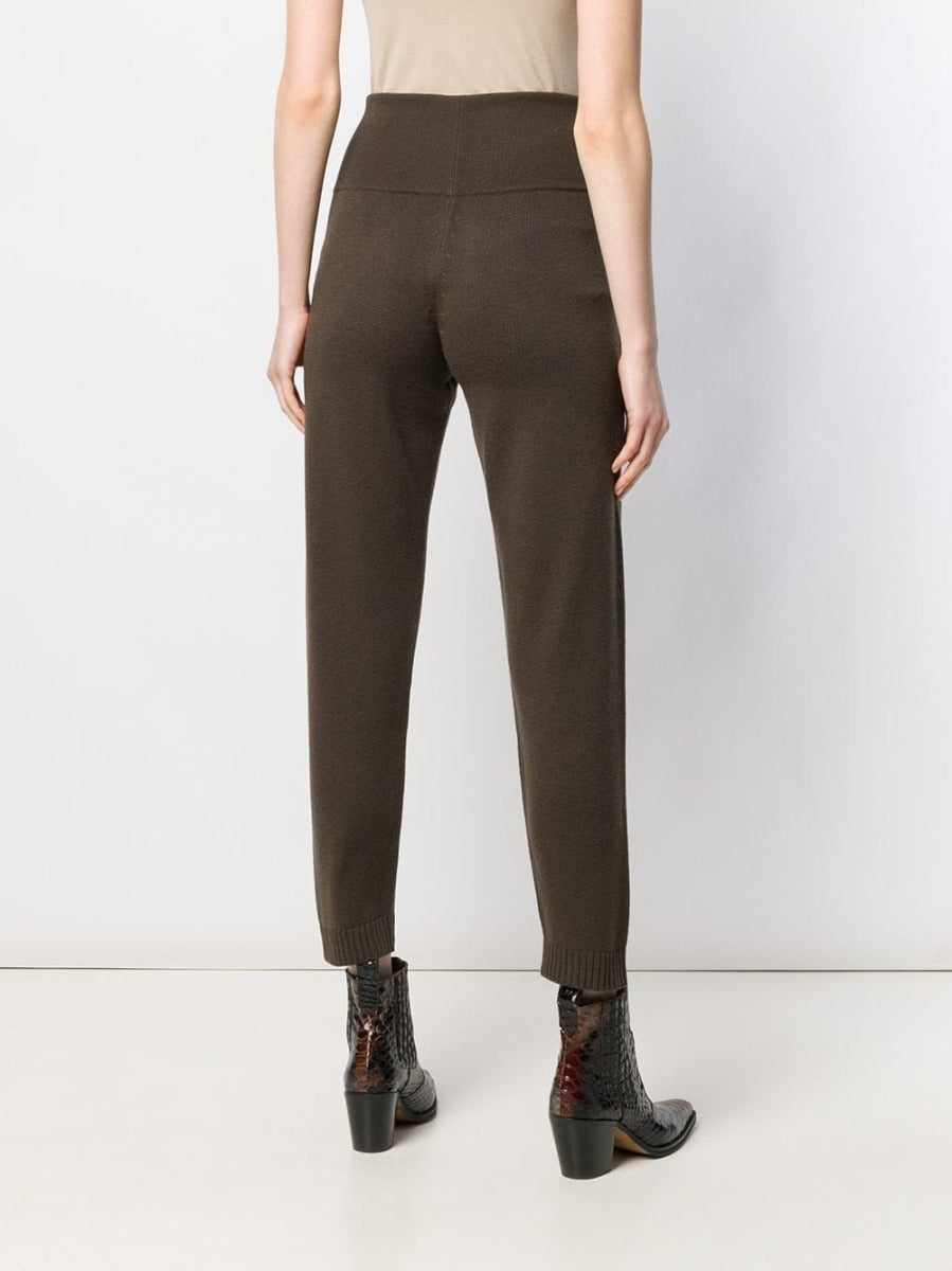Hermès brown knitted lounge trousers showing a cozy, relaxed fit with ribbed waistband and soft knit fabric.