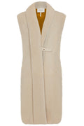 Hermès sheepskin gilet with silk scarf interior, stylish blazer or jacket featuring luxurious materials and elegant design.