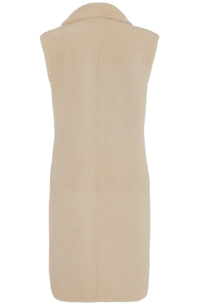 Hermès sheepskin gilet with silk scarf interior, stylish blazer with soft leather texture and elegant design.