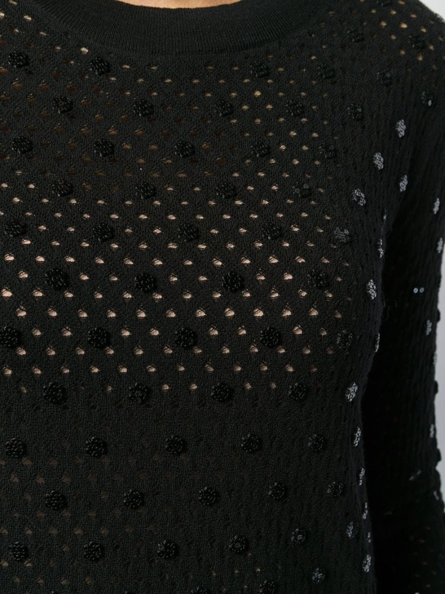 Black Louis Vuitton sequin embellished top with intricate detailing, stylish and elegant for fashionable occasions.