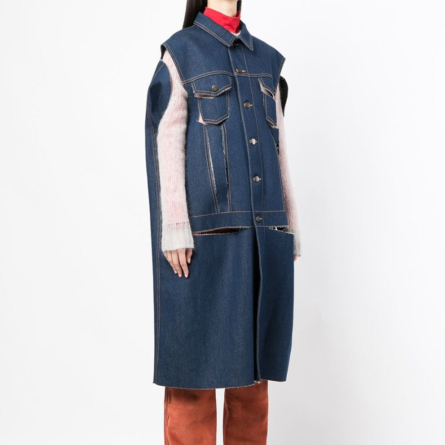 Maison Margiela Décortiqué denim cape coat featuring a stylish, oversized design with intricate detailing and unique craftsmanship.
