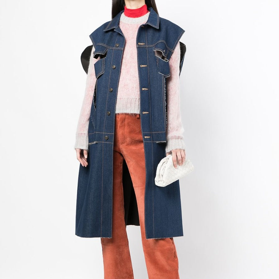 Décortiqué denim cape coat by Maison Margiela featuring a textured design and oversized fit, perfect for stylish layered looks.