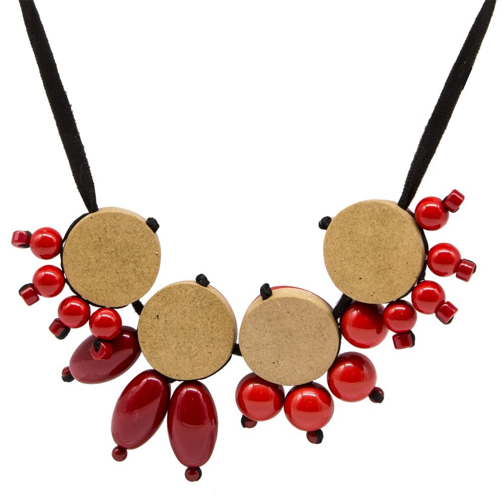 Red acrylic pendant necklace from Other Designers, featuring a bold, modern design with a sleek pendant on a chain.