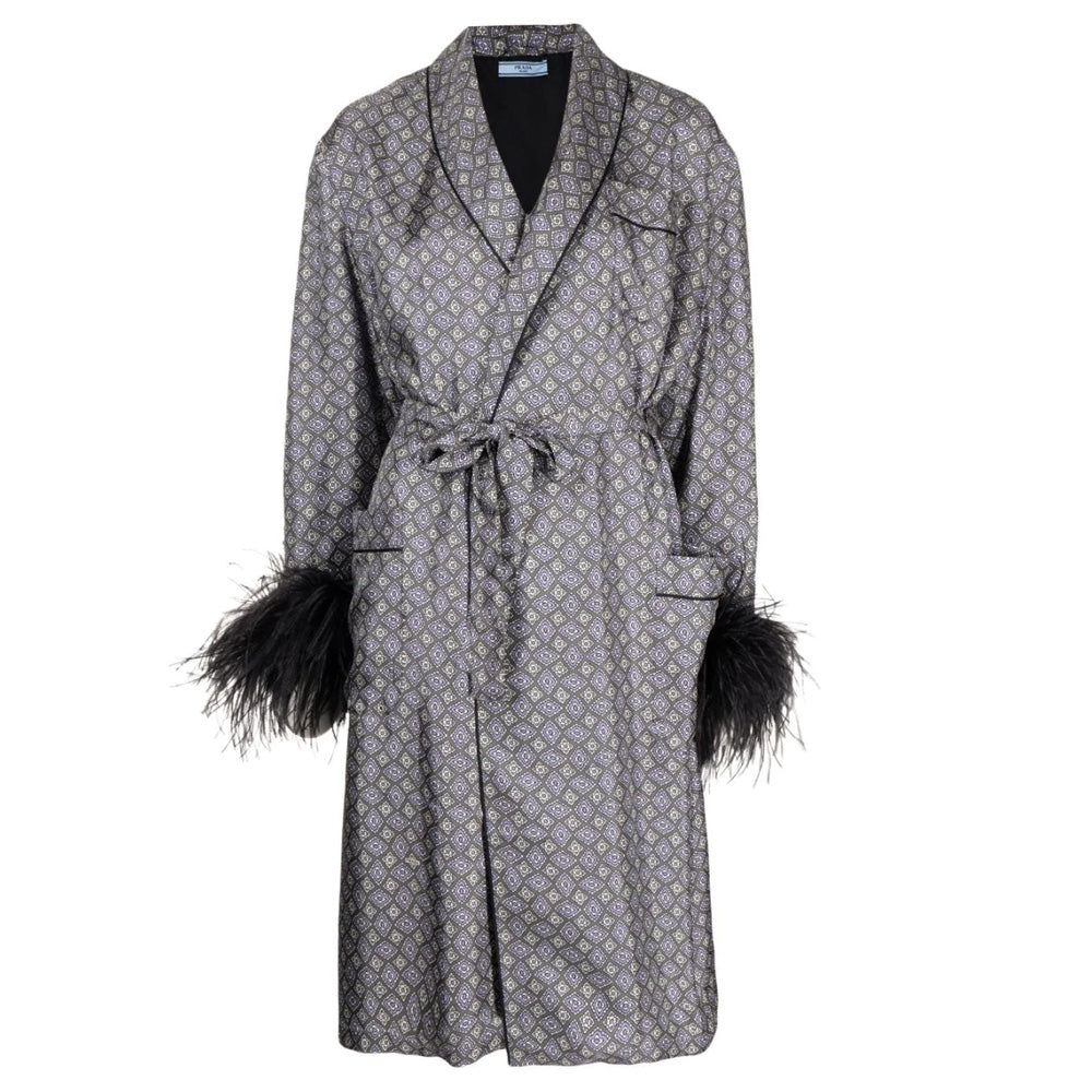 Prada silk robe with feather details, elegant and luxurious, showcasing a smooth fabric and delicate feather accents.