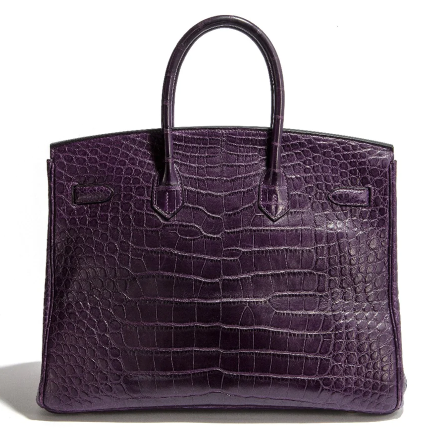Hermès Birkin 35 Amethyst PHW top handle bag in purple leather with gold hardware, showcasing elegant craftsmanship.