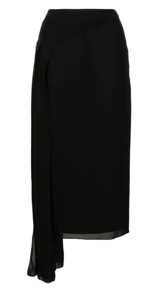 Chanel asymmetric silk midi skirt with flowing design and elegant drape, displayed in a retail setting.