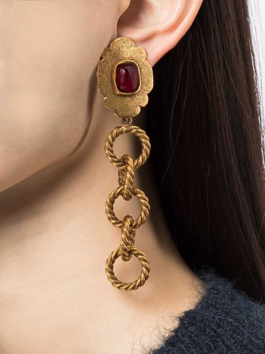 Chanel Ruby Gripoix chainlink drop earrings with vibrant red stones and elegant gold-tone chain design.