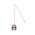 Delfina Delettrez single earring featuring a unique stone design, crafted by designer brand, showcasing artistic jewelry craftsmanship.