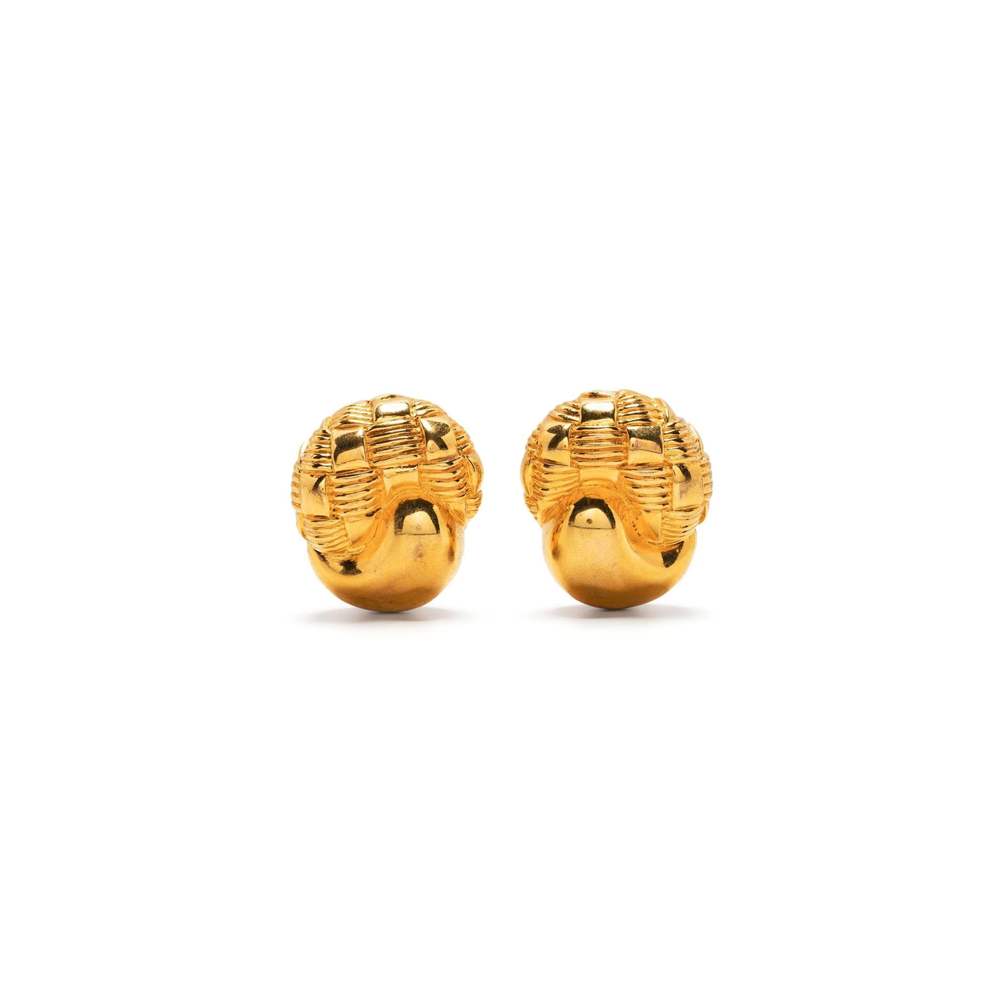 Celine gold-tone clip-on earrings featuring horn motif design, shown as stylish stud earrings on a white background.